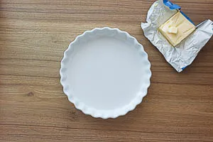 Auflaufform mit etwas Butter einfetten