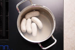 Weißwürste kochen
